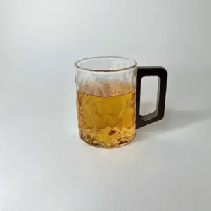 لیوان پیرکس دسته چوبی گرد شفاف برفی